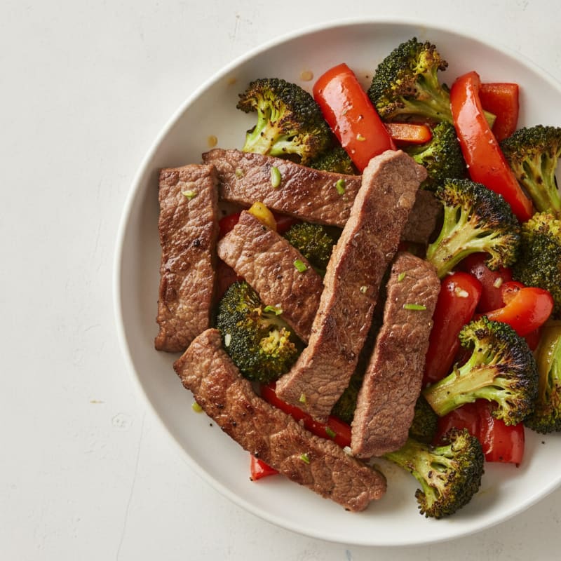 Seared Lean Beef Strips with Roasted Broccoli and Bell Peppers