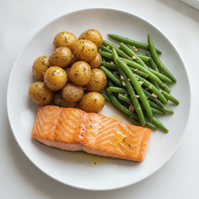 Seared Salmon Fillet with Garlic Green Beans and Herb-Roasted Baby Potatoes