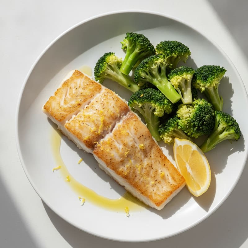 Seared Cod Fillet with Steamed Broccoli and Lemon
