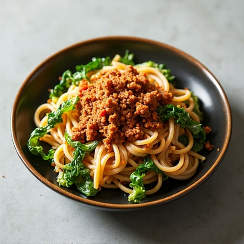 Spicy Lean Ground Pork Whole Wheat Noodles with Crispy Garlic Greens