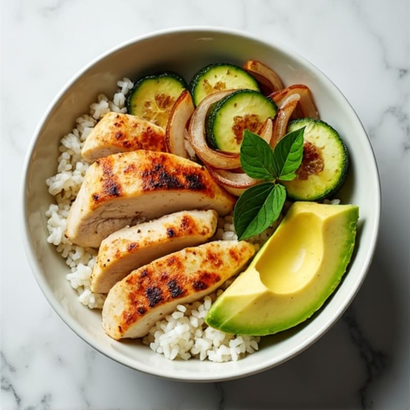 Grilled Chicken and Zucchini Rice Bowl with Fresh Avocado