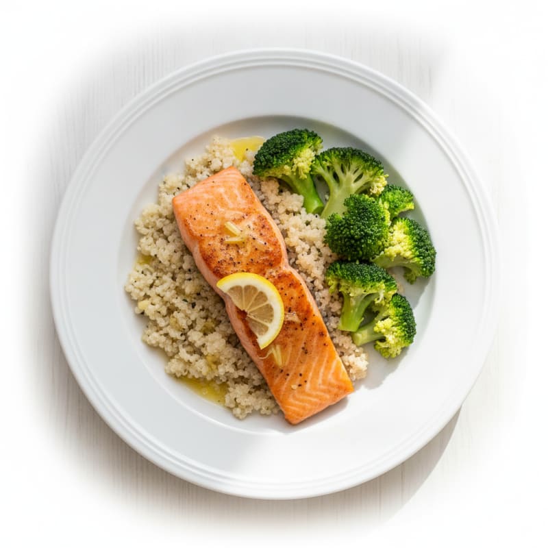 Seared Salmon Fillet with Steamed Broccoli and Garlic Quinoa