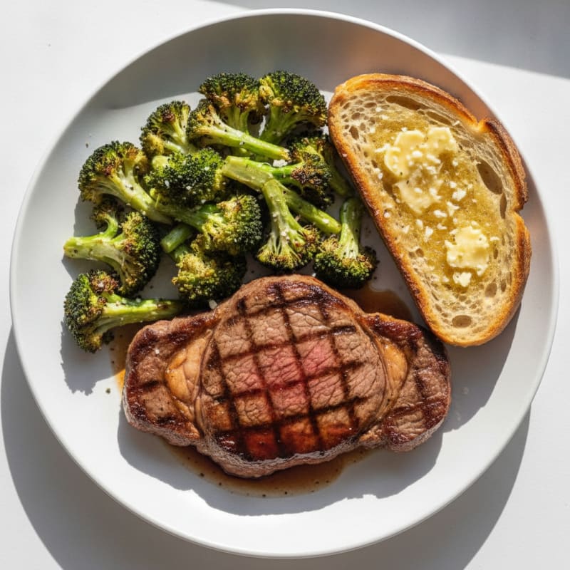 Seared Steak with Roasted Broccoli and Garlic Bread