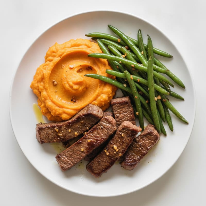 Seared Beef Strips with Garlic Green Beans and Sweet Potato Mash
