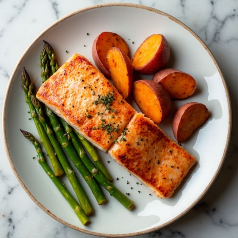 Seared Salmon Fillet with Roasted Sweet Potatoes and Asparagus