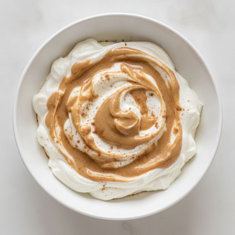 Creamy Vanilla Protein Greek Yogurt with Almond Butter Swirl