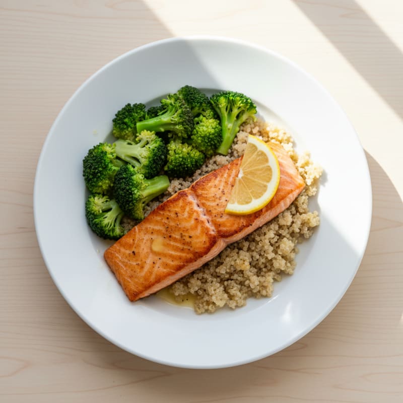 Seared Salmon Fillet with Steamed Broccoli and Quinoa