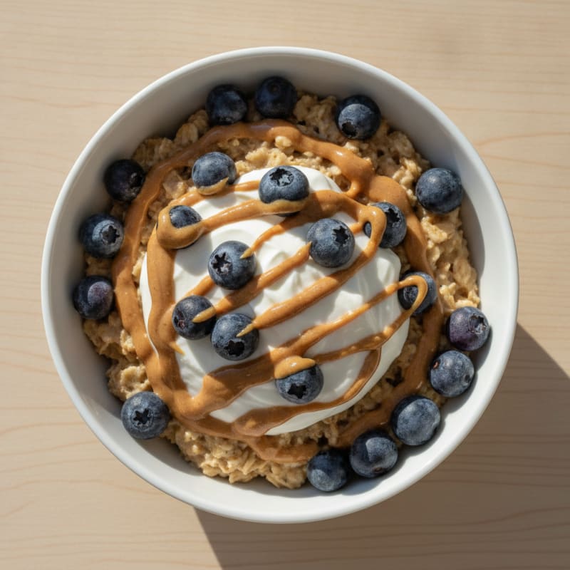 Greek Yogurt Oatmeal Bowl with Peanut Butter and Fresh Berries