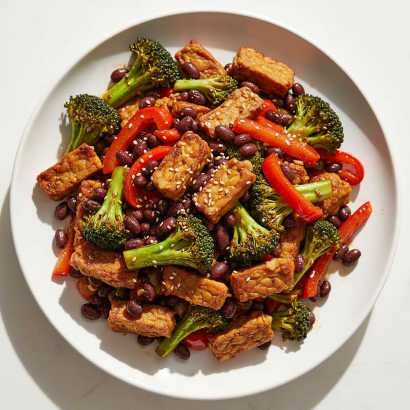 Hearty Tempeh and Black Bean Stir Fry with Broccoli and Peppers