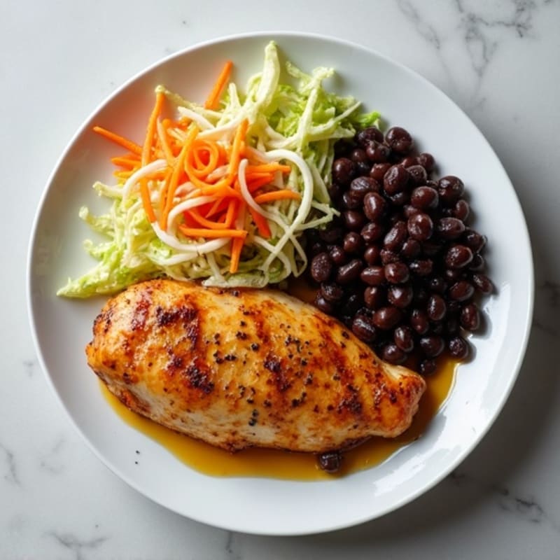 Citrus-Marinated Chicken with Creamy Black Beans and Crunchy Cabbage Slaw