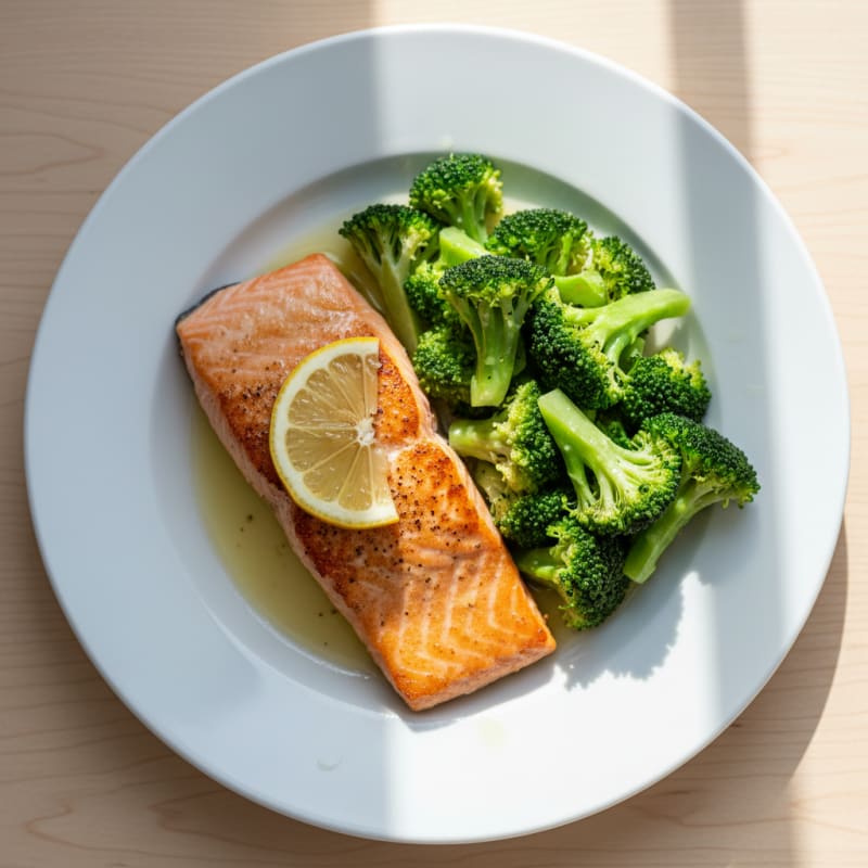 Seared Salmon Fillet with Steamed Broccoli and Lemon