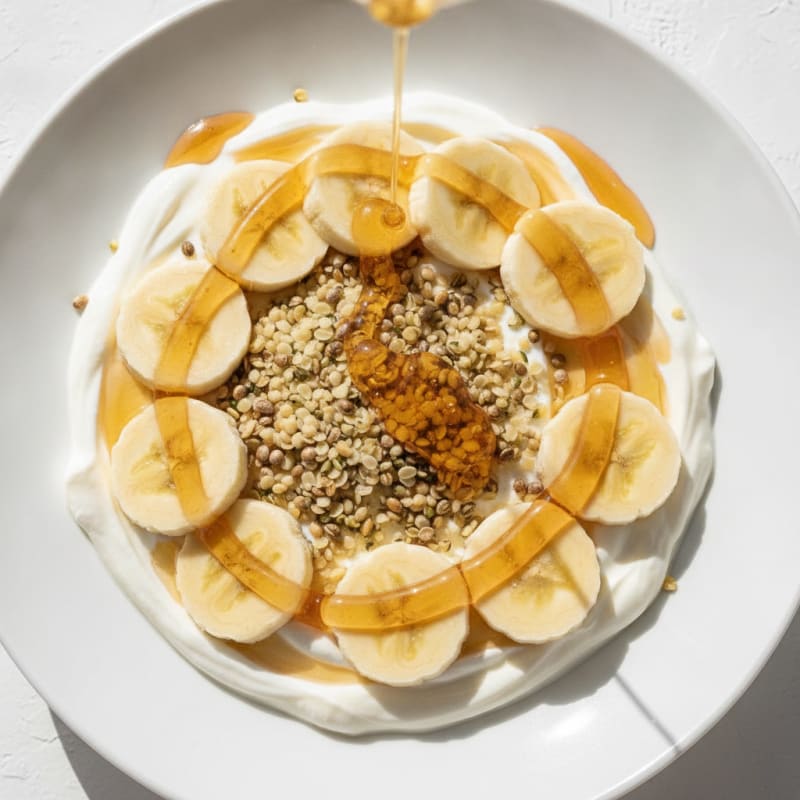 Greek Yoghurt Bowl with Sliced Banana and Honey Drizzle