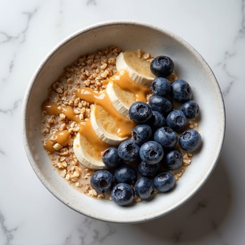 Protein-Packed Blueberry Oatmeal Bowl with Almond Butter Drizzle
