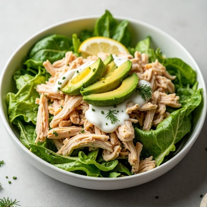 Tender Shredded Chicken with Creamy Lemon Herb Dressing and Fresh Greens