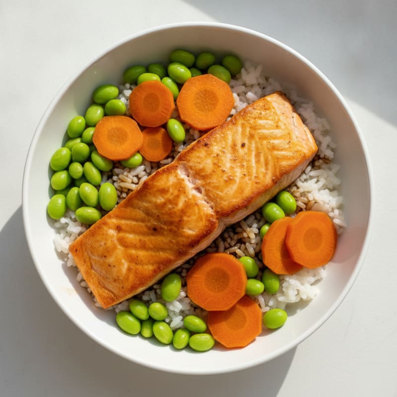 Seared Salmon Rice Bowl with Steamed Edamame and Pickled Carrots