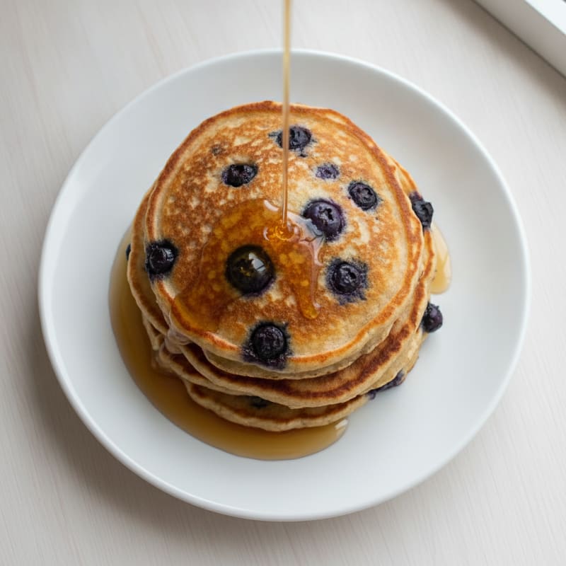 Blueberry Ricotta Pancakes with Maple Syrup