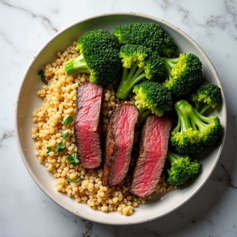 Seared Lean Beef Strips with Roasted Broccoli and Quinoa