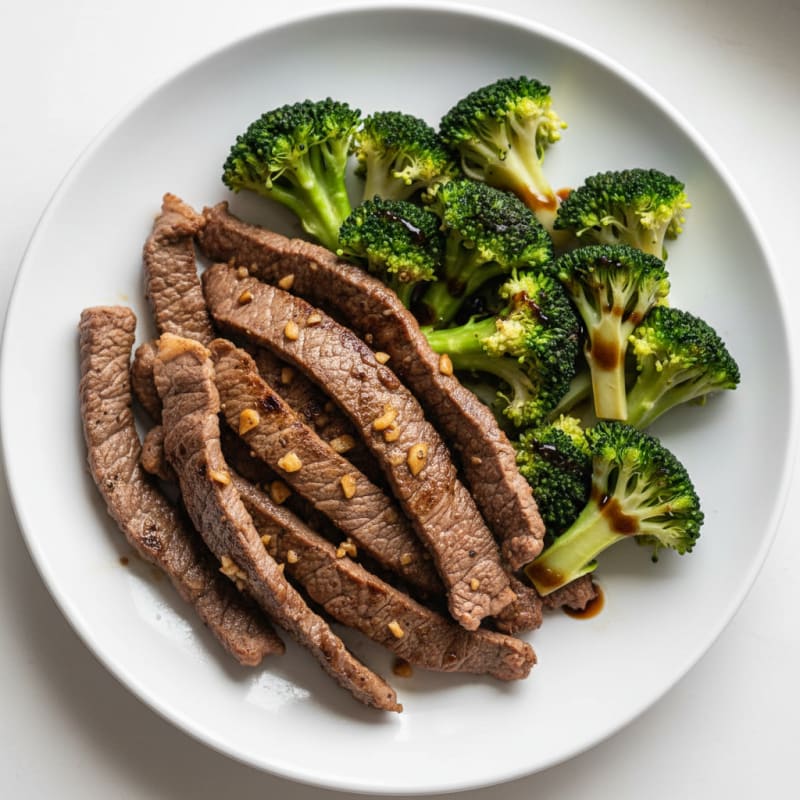Seared Lean Beef Strips with Steamed Broccoli