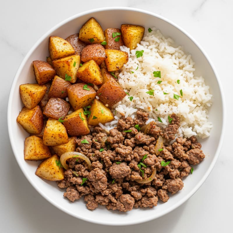 Savory Ground Beef Bowl with Roasted Potatoes and Fluffy Rice