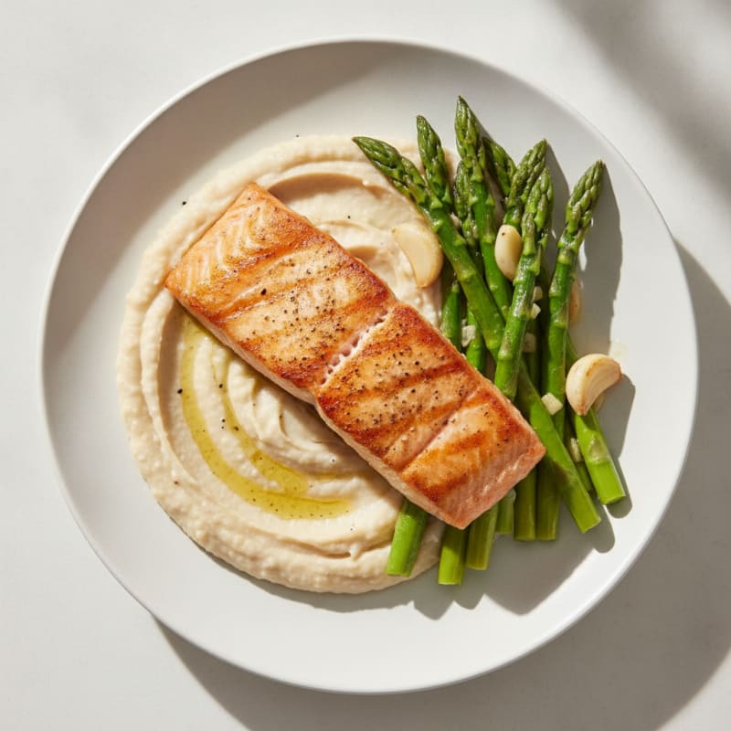 Seared Salmon Fillet with Creamy White Bean Mash and Steamed Asparagus