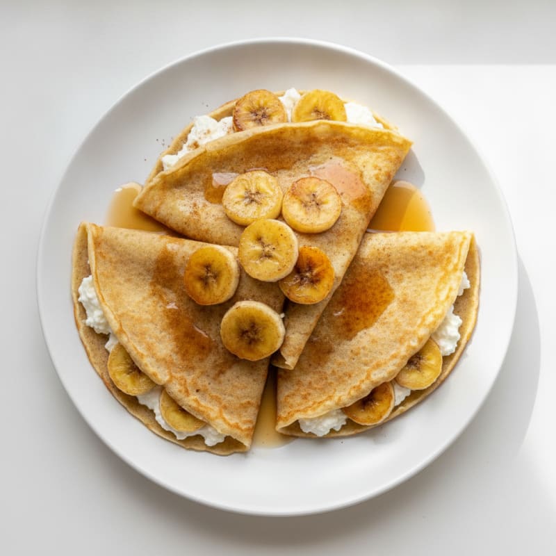 Banana Ricotta Crepes with Maple Drizzle