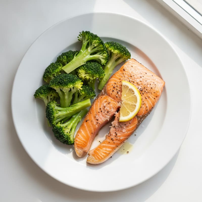 Seared Salmon Filet with Steamed Broccoli and Lemon