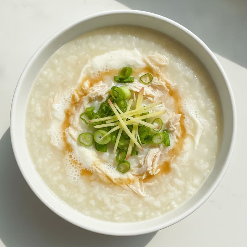 Egg White Congee with Shredded Chicken and Scallions