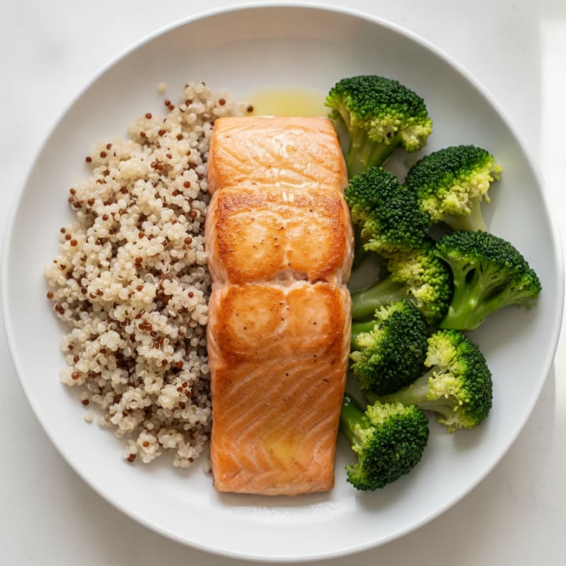Seared Salmon Fillet with Steamed Broccoli and Quinoa