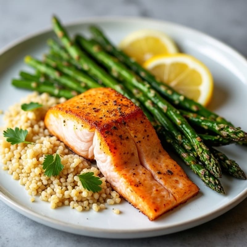 Crispy Pan-Seared Salmon with Lemon-Herb Roasted Asparagus and Quinoa