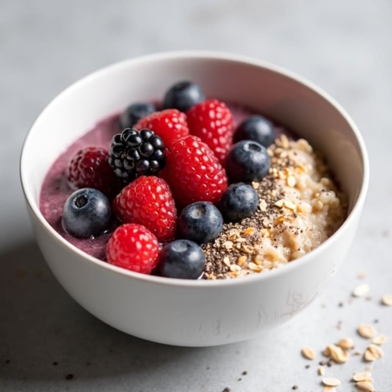 High-Protein Creamy Oatmeal with Berries and Seeds