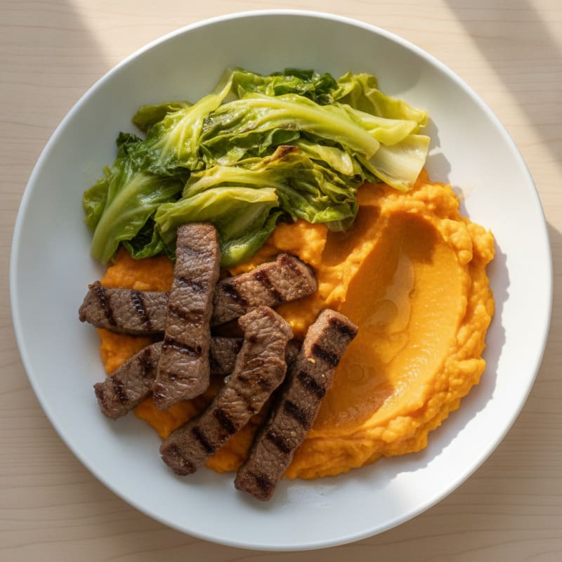 Seared Beef Strips with Steamed Cabbage and Sweet Potato Mash