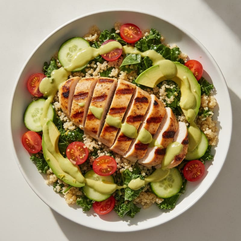Grilled Chicken and Quinoa Bowl with Creamy Avocado Dressing