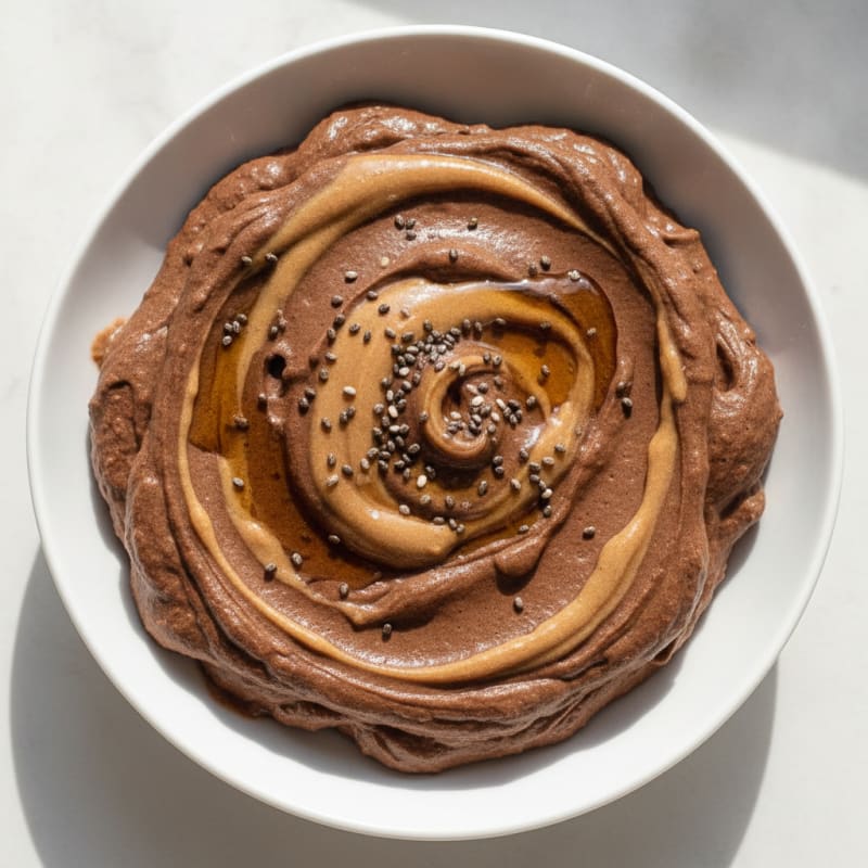 Creamy Chocolate Protein Pudding with Almond Butter Swirl