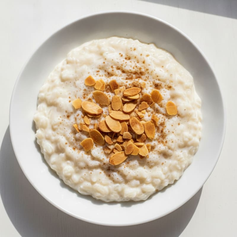 Silky Protein Rice Pudding with Vanilla Whey and Sliced Almonds