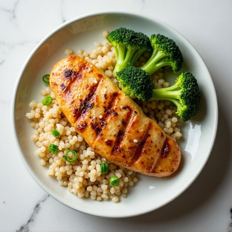Grilled Chicken Breast with Quinoa and Steamed Broccoli