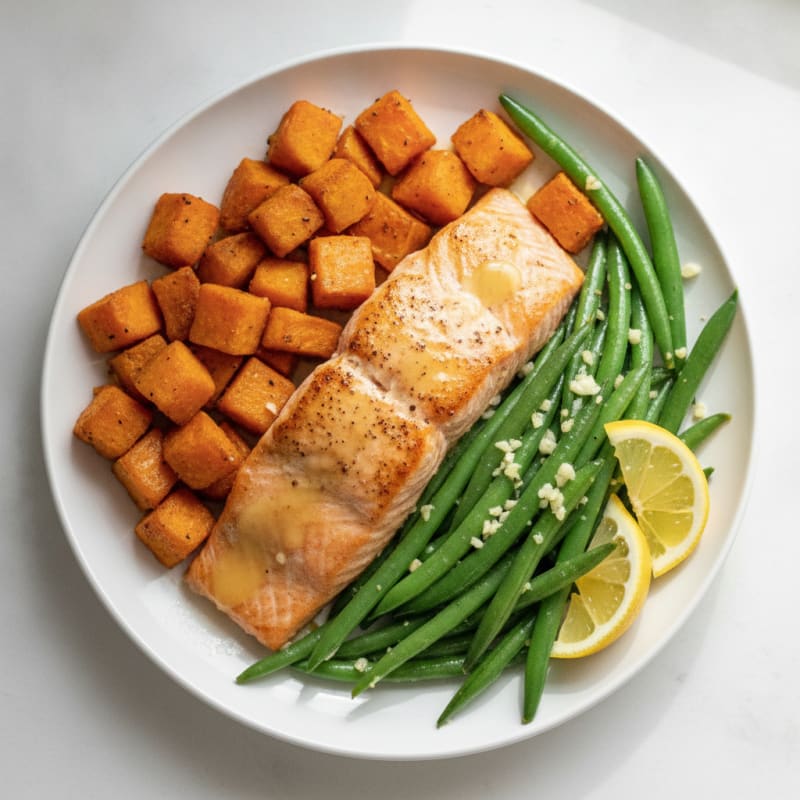 Seared Salmon Fillet with Roasted Sweet Potatoes and Garlic Green Beans