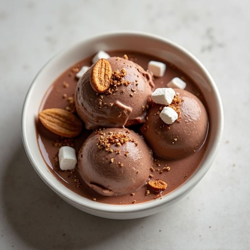 Dark Chocolate Protein Ice Cream with Crunchy Almonds and Marshmallow Bits