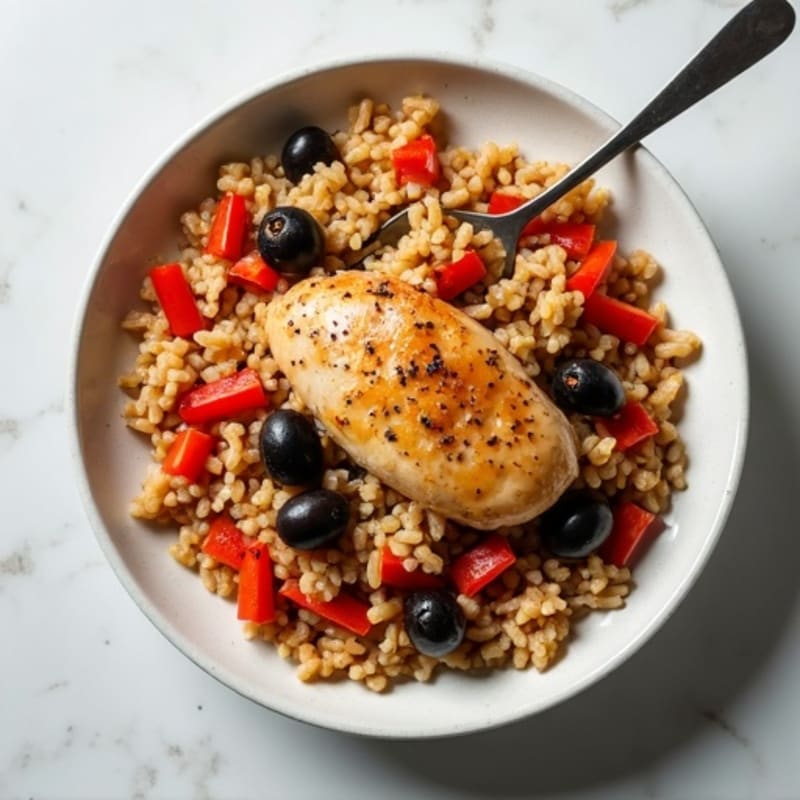 Hearty One-Pan Chicken and Brown Rice with Bell Peppers and Olives