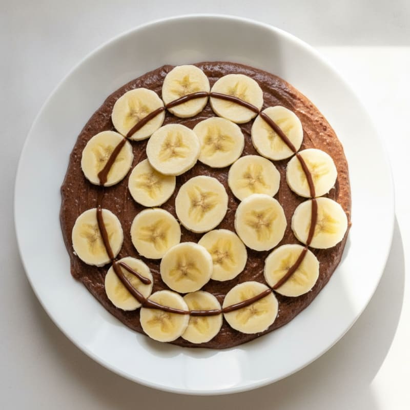 Silky Chocolate Protein Pudding with Sliced Bananas