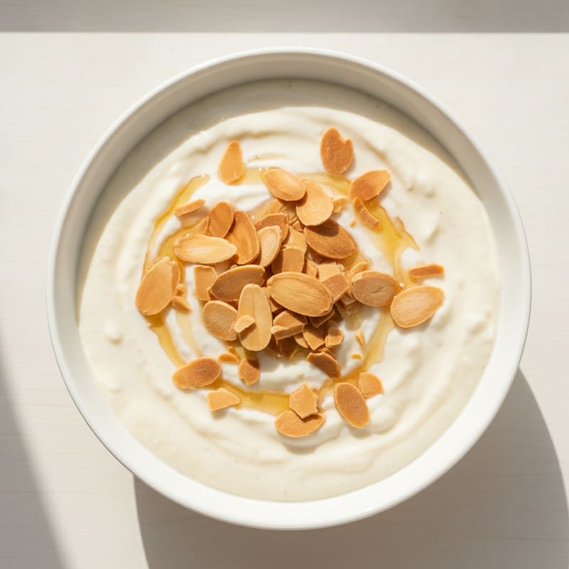 Greek Yogurt Protein Pudding with Almonds and Cardamom
