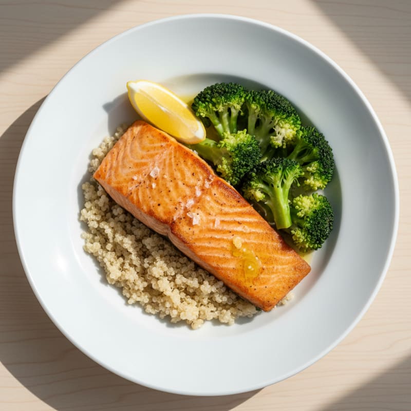 Seared Salmon Fillet with Steamed Broccoli and Quinoa