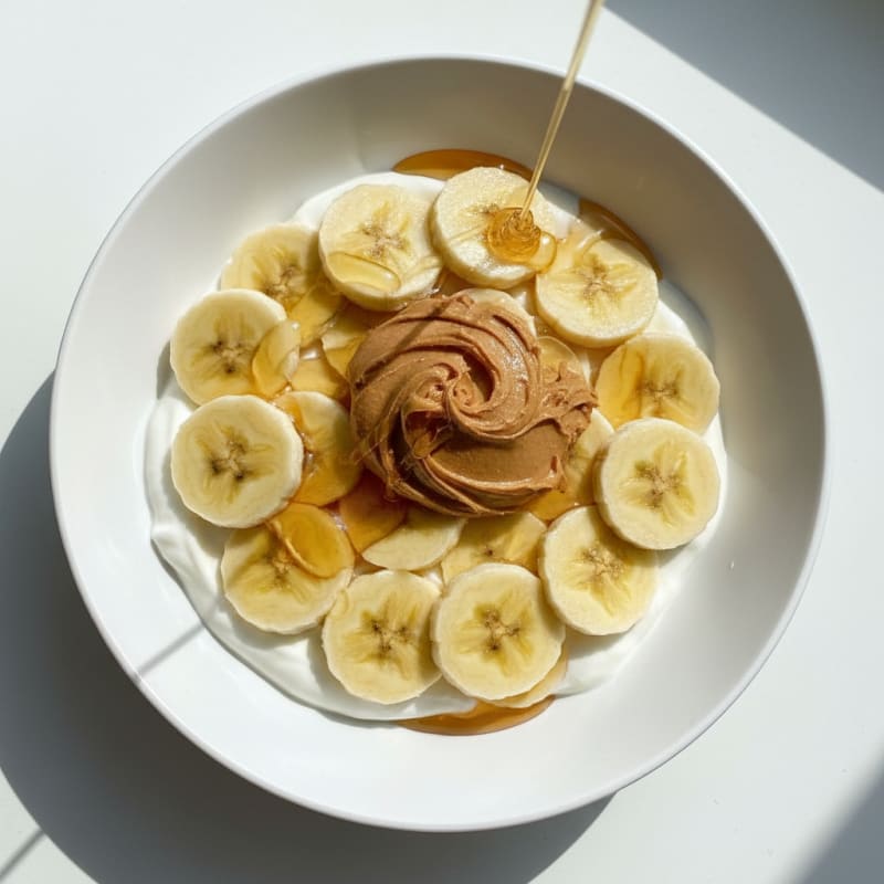 Creamy Peanut Butter Yogurt Bowl with Honey and Banana