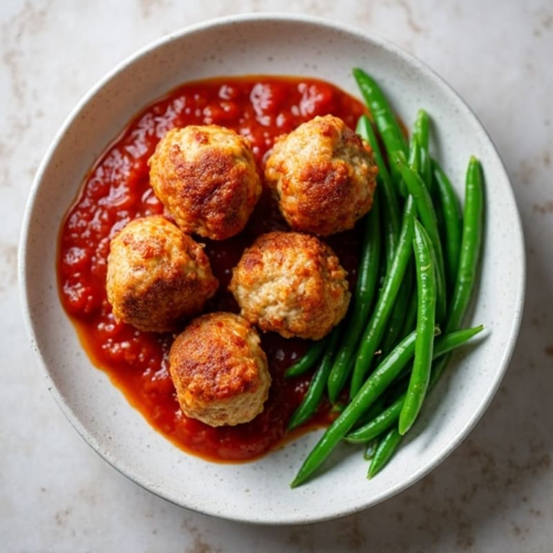 Crispy Baked Turkey Meatballs with Marinara and Green Beans