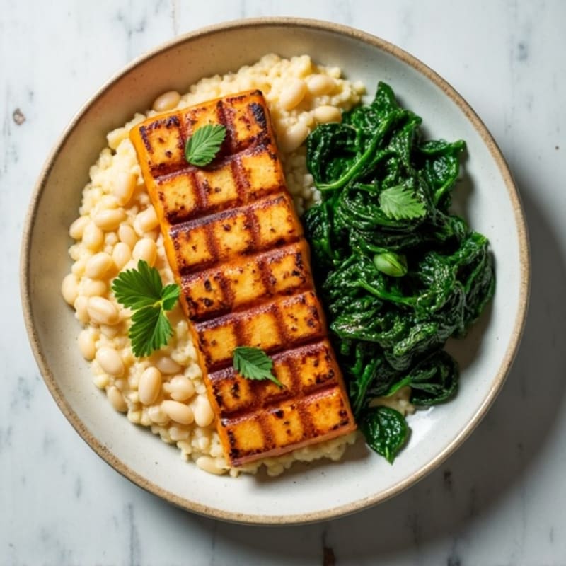 Grilled Tempeh with Creamy White Bean Mash and Sautéed Greens