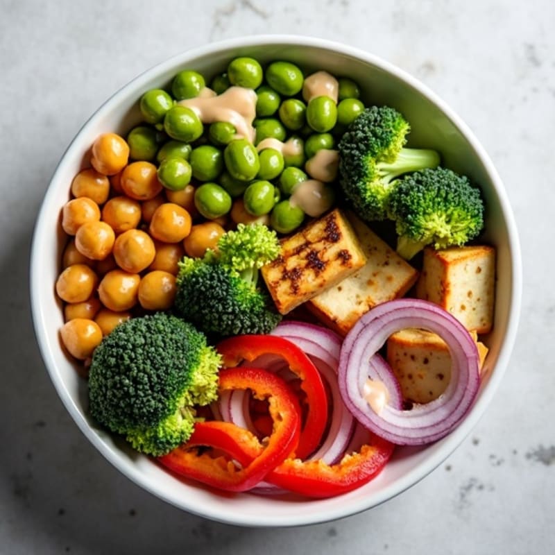 Crispy Roasted Chickpea and Vegetable Bowl with Creamy Lemon-Tahini Dressing