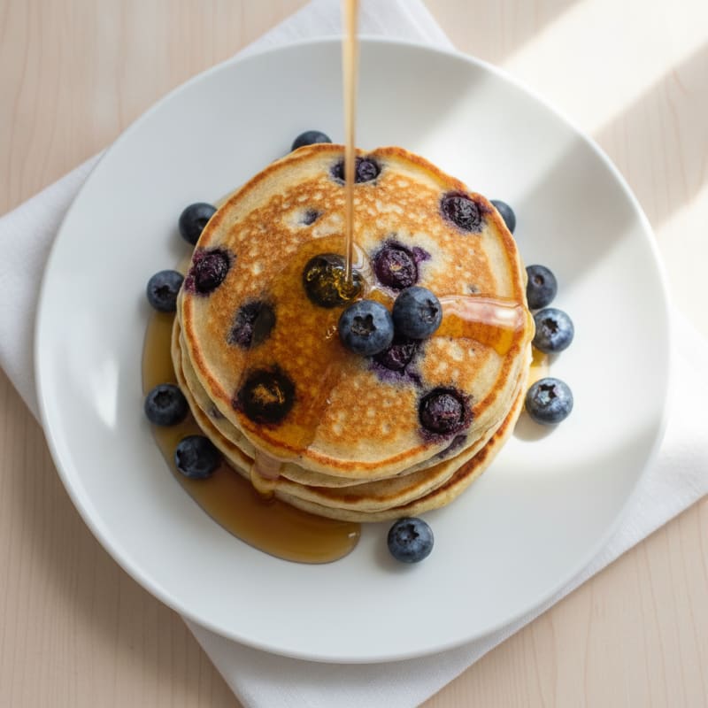 Blueberry Ricotta Pancakes with Maple Syrup