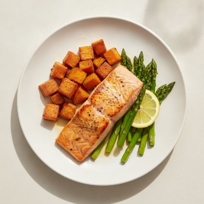 Seared Salmon Fillet with Roasted Sweet Potatoes and Asparagus