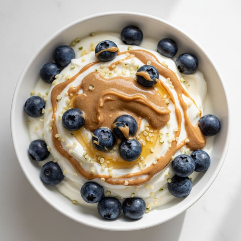 Creamy Greek Yogurt and Protein Powder Parfait with Almond Butter