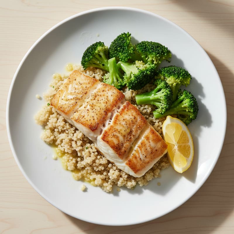 Seared Cod Fillet with Steamed Broccoli and Quinoa