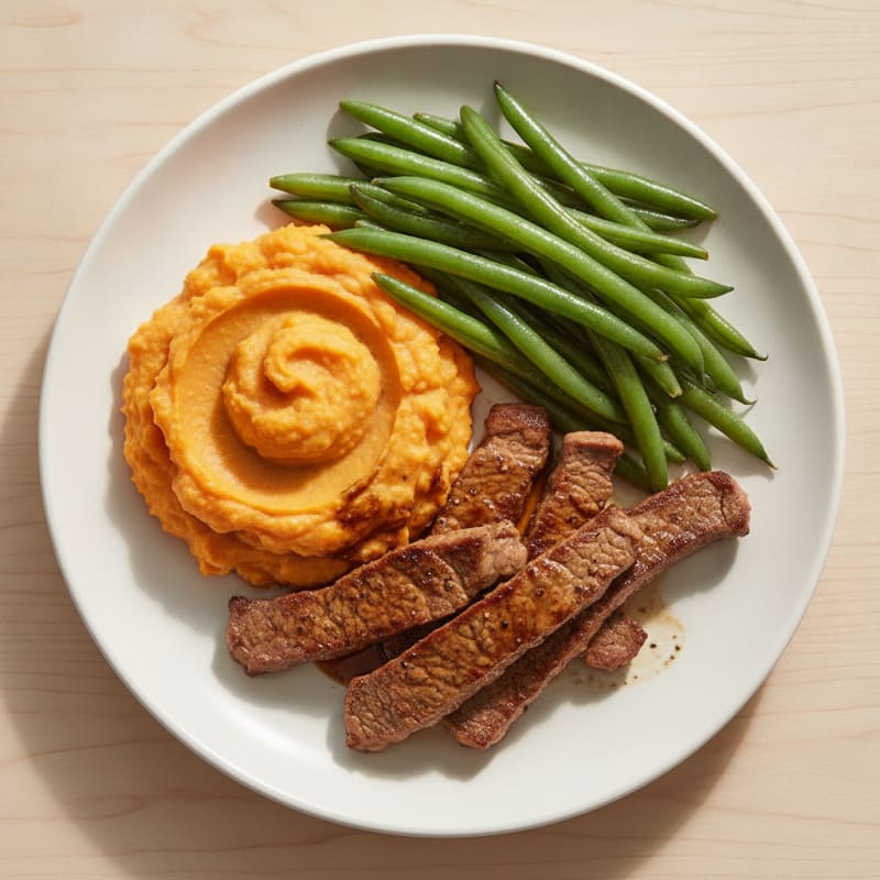 Seared Lean Beef Strips with Steamed Green Beans and Sweet Potato Mash